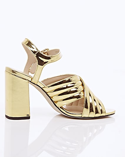 360 degree animation of product Gold patent cross strappy heels frame-11