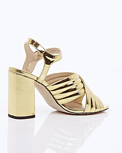 360 degree animation of product Gold patent cross strappy heels frame-12