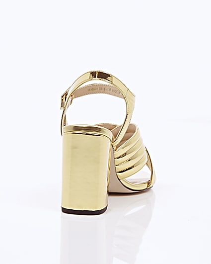360 degree animation of product Gold patent cross strappy heels frame-15