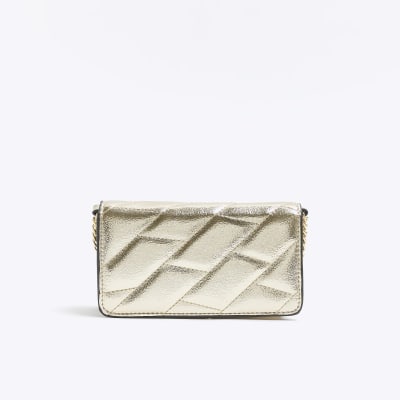 Gold quilted chain cross body bag River Island