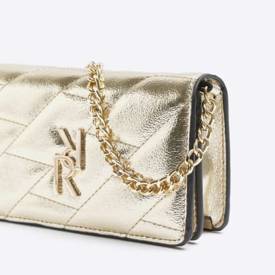 Gold quilted chain cross body bag River Island