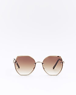 Gold rimless oversized sunglasses