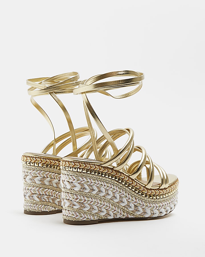 Gold strappy wedges