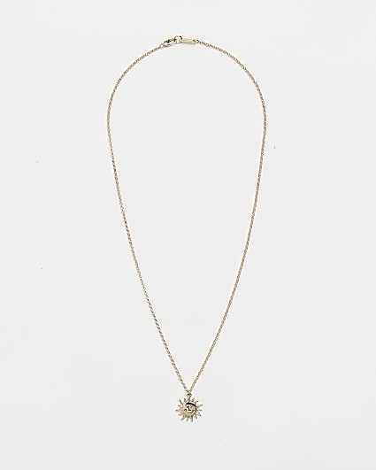 Gold sun pendant necklace
