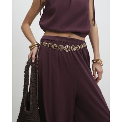 Gold swirl chain belt