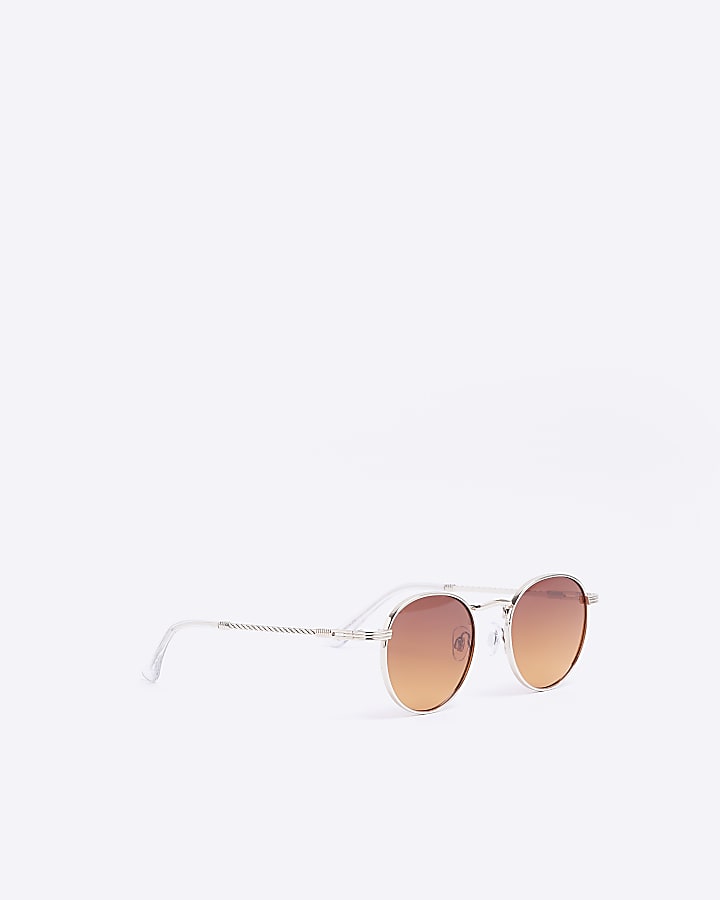 Gold tinted lenses round sunglasses