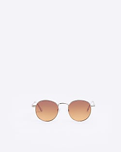 Gold tinted lenses round sunglasses
