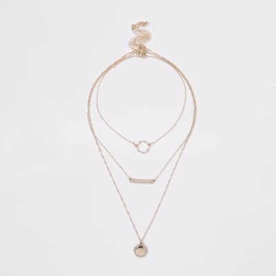Gold tone circle and bar layer necklace pack