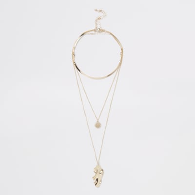 Gold tone coin disc layered necklace