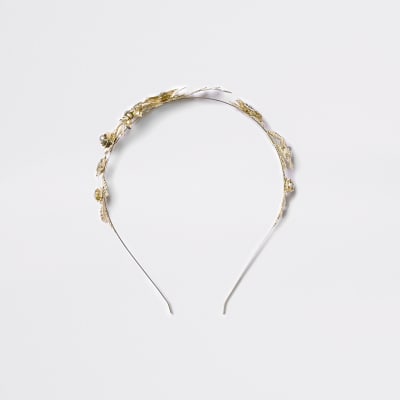 Gold tone diamante flower hair band