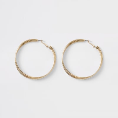 Gold tone layered twist hoop earrings