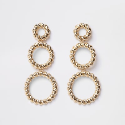 Gold tone triple twist hoop earrings