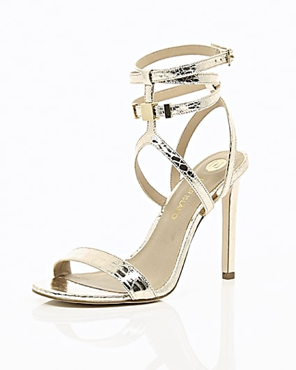 360 degree animation of product Gold wide fit metallic caged strappy sandals frame-0