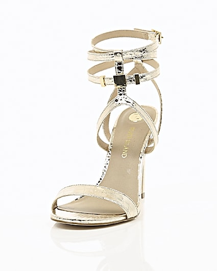 360 degree animation of product Gold wide fit metallic caged strappy sandals frame-2