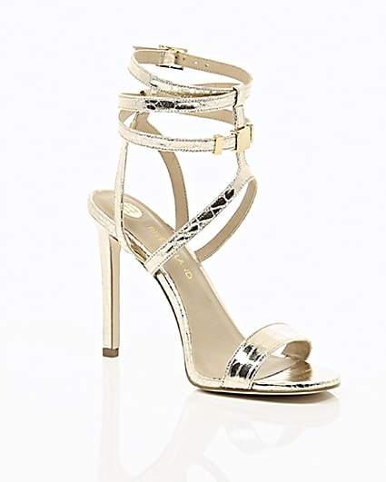 360 degree animation of product Gold wide fit metallic caged strappy sandals frame-7