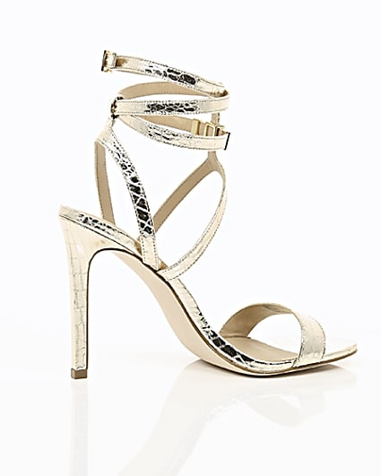 360 degree animation of product Gold wide fit metallic caged strappy sandals frame-11