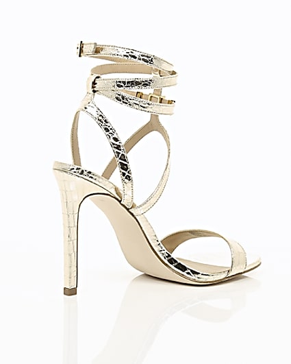 360 degree animation of product Gold wide fit metallic caged strappy sandals frame-12