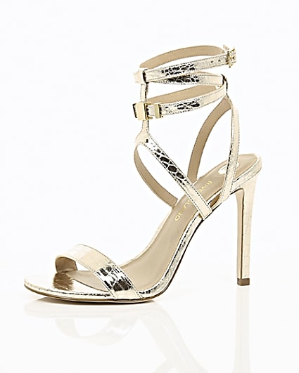 360 degree animation of product Gold wide fit metallic caged strappy sandals frame-23