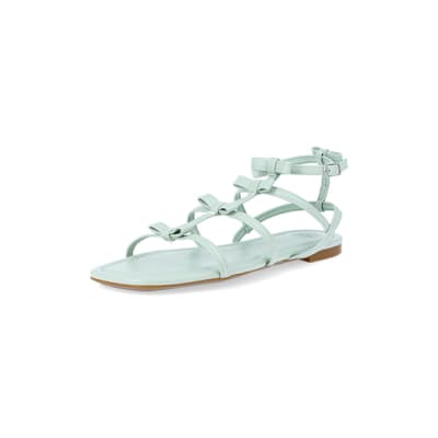 360 degree animation of product Green - Light Bow Gladiator Sandal frame-0