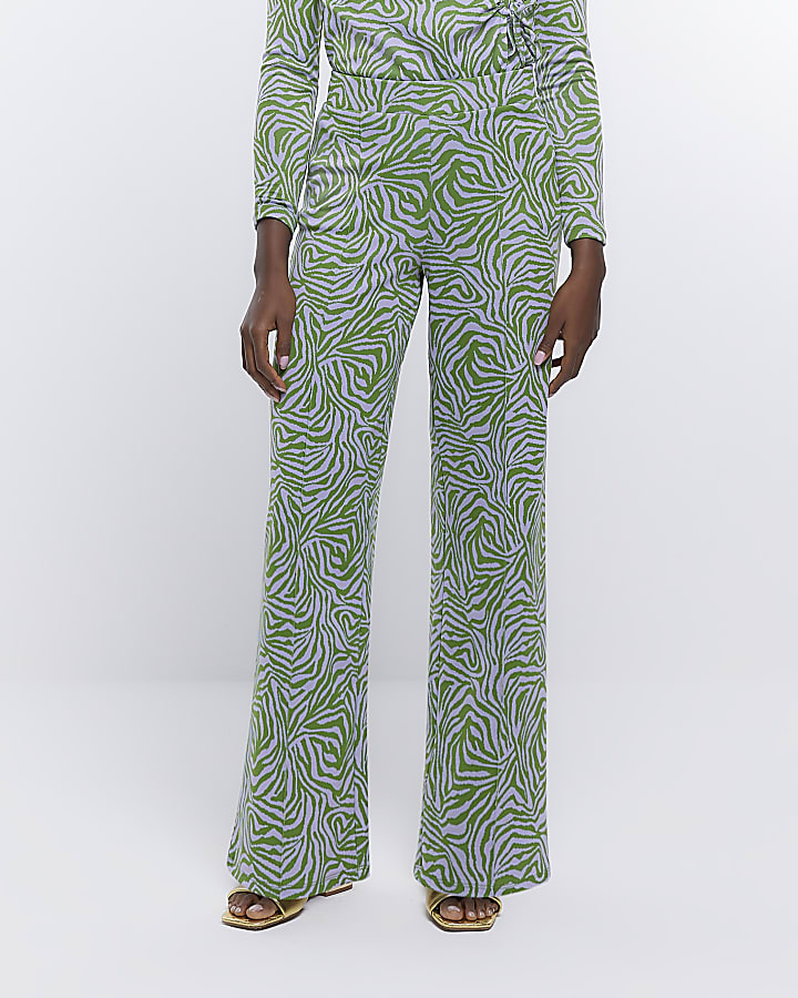 Green animal print wide leg trousers