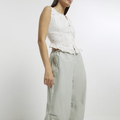 Green baggy low rise parachute trousers