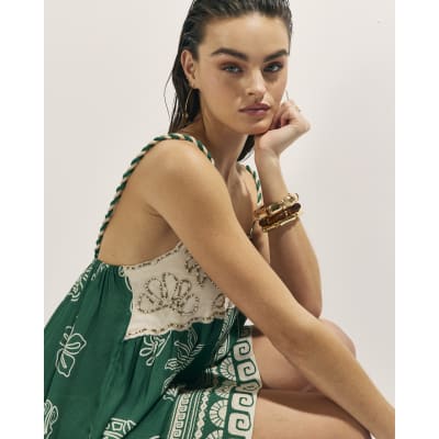 green dress with circles Sage Green Cap Sleeve Crossover Bardot Neckline 50s Swing Dress – Pretty  Kitty Fashion main image 1