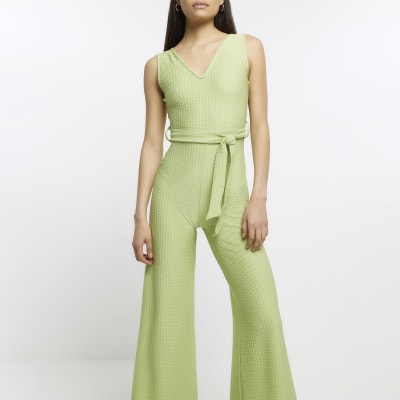 Green belted flare jumpsuit