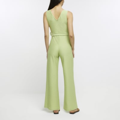 Green belted flare jumpsuit