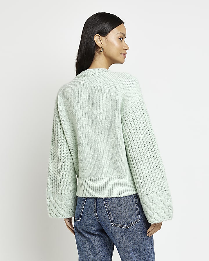 Green cable knit jumper