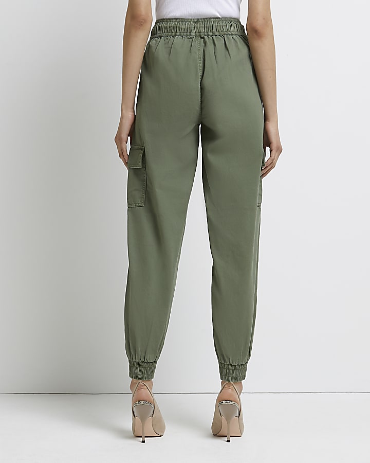 Green cargo trousers