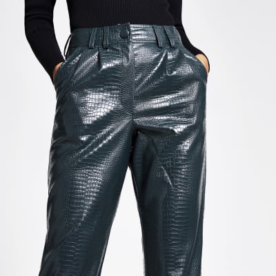 green leather look trousers