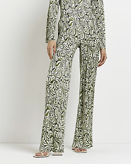 Green floral pleated wide leg trousers
