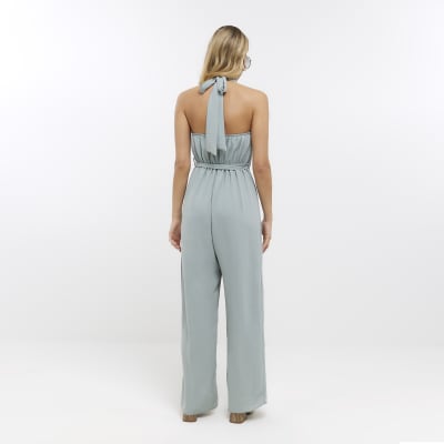 Green halter neck jumpsuit