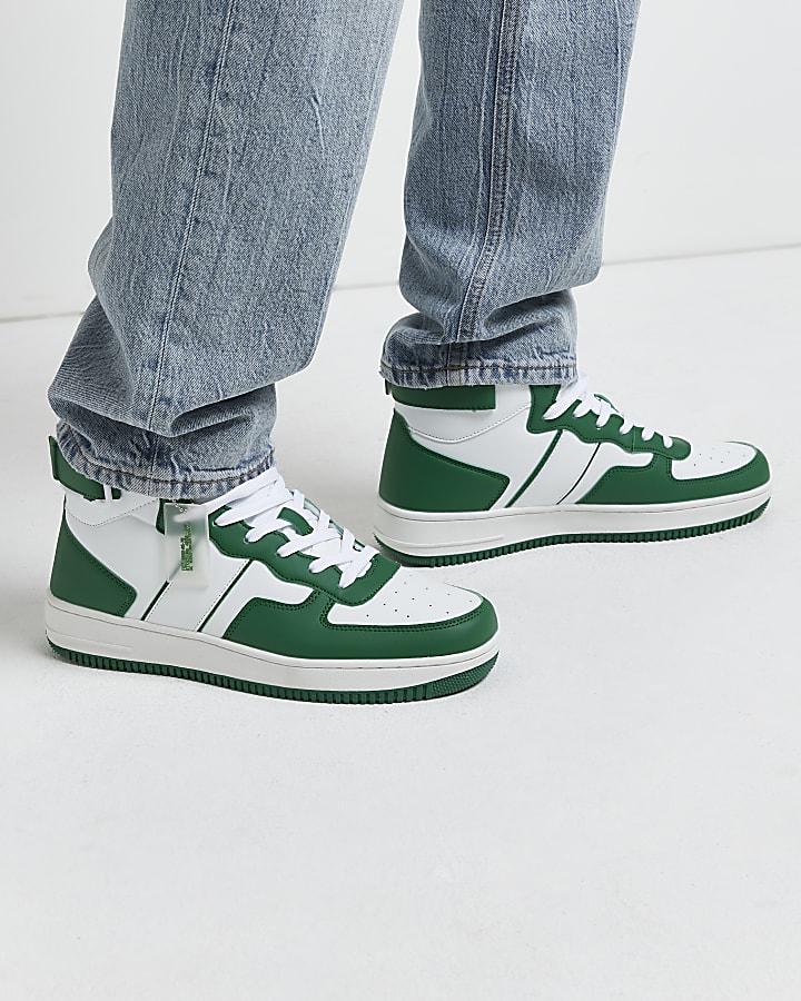 Green high top court trainers