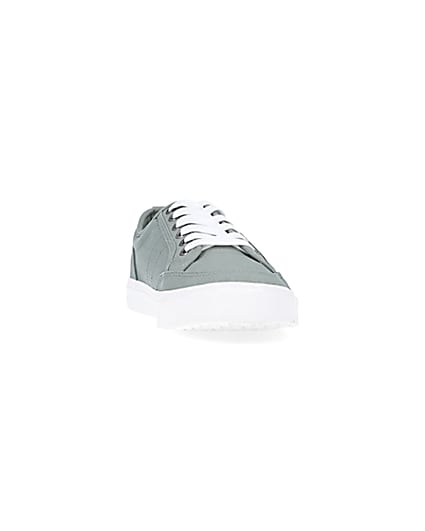 360 degree animation of product Green lace up plimsolls frame-20