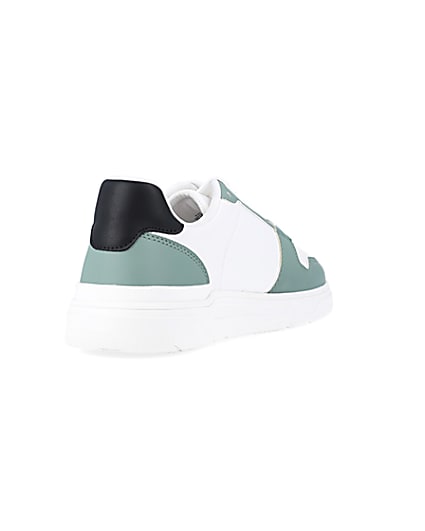 360 degree animation of product Green low top trainers frame-11