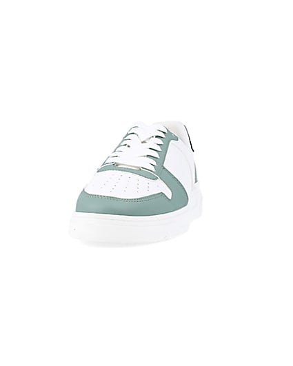 360 degree animation of product Green low top trainers frame-22