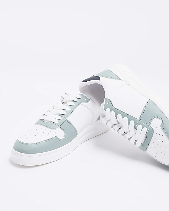 Green low top trainers