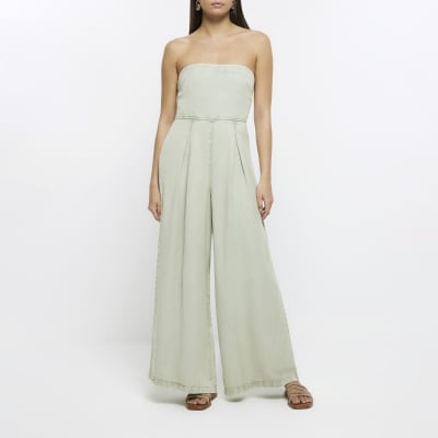 Green lyocell bardot jumpsuit | River Island