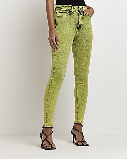 Green mid rise skinny jeans