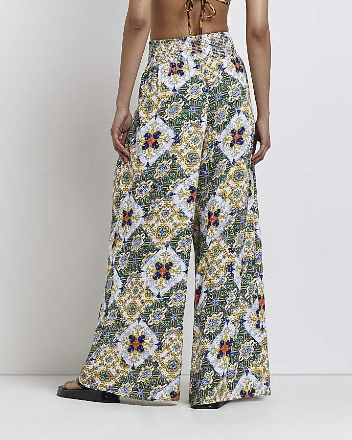 Green printed palazzo trousers