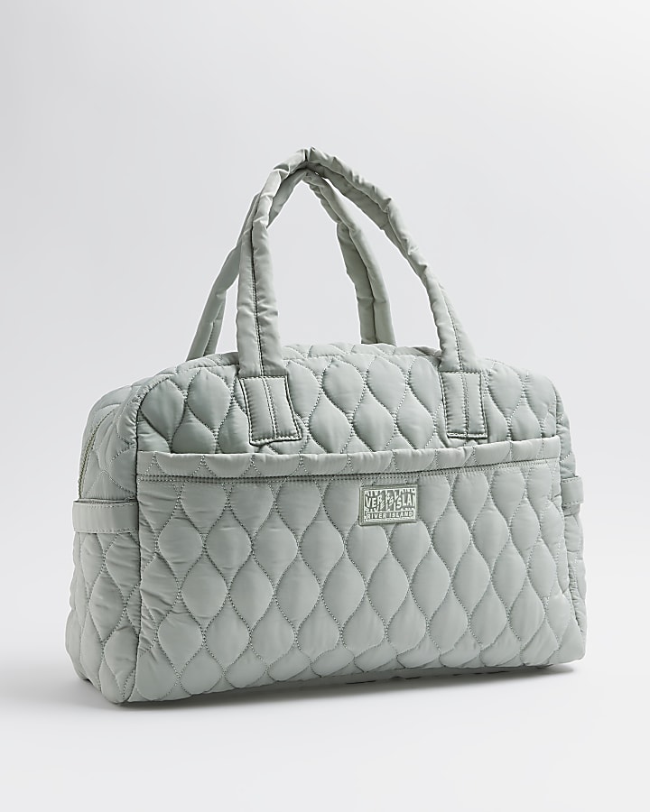 Green quilted weekend bag