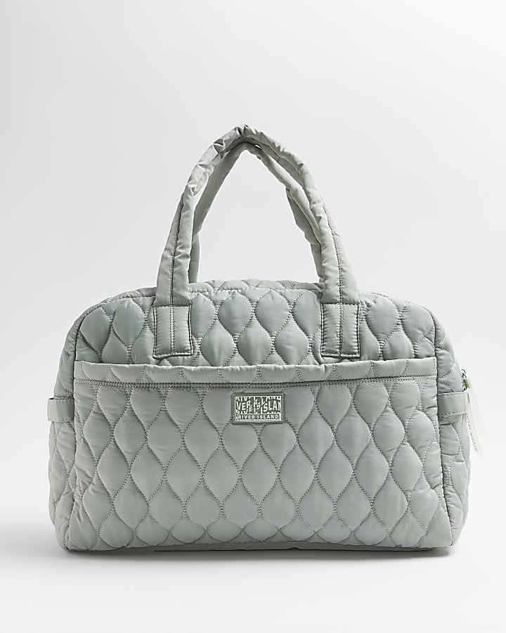 Green quilted weekend bag