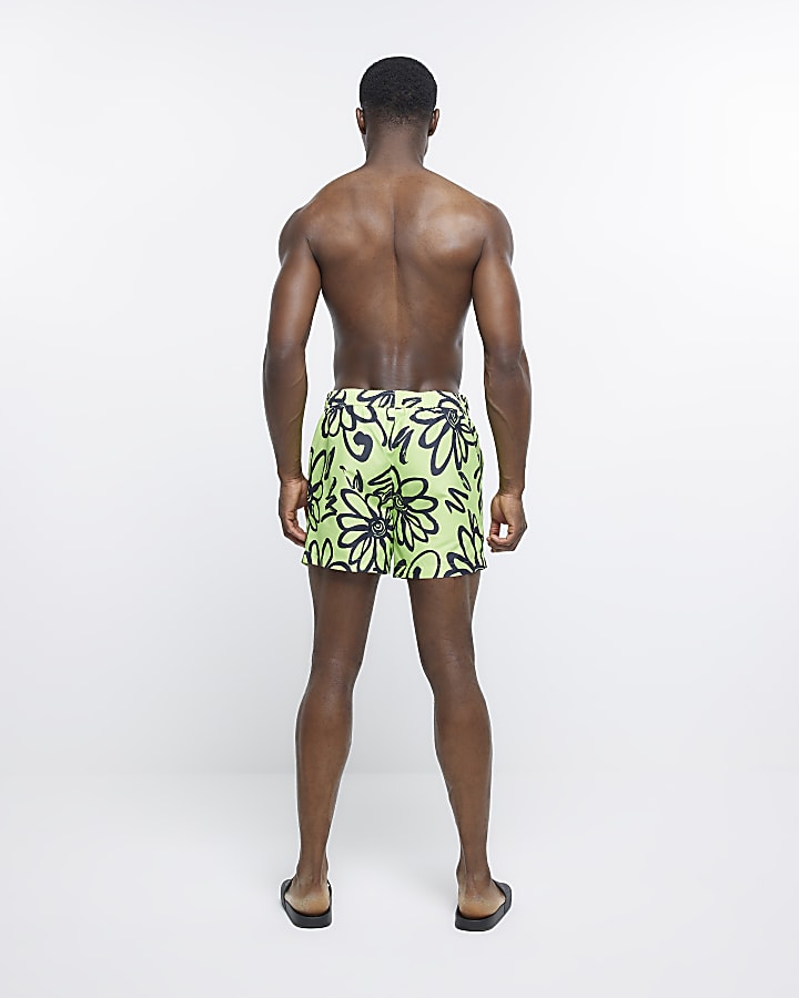 Green regular fit floral swim shorts