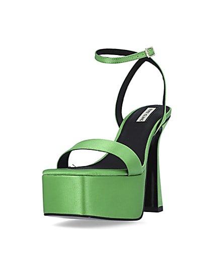 360 degree animation of product Green satin platform heels frame-23