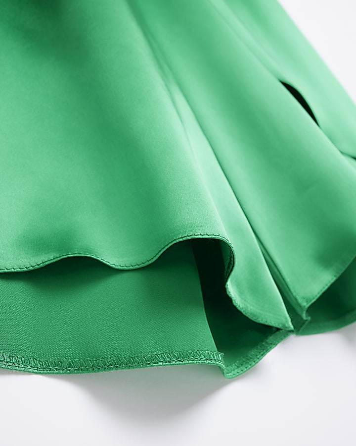 Green satin wrap over wide leg trousers