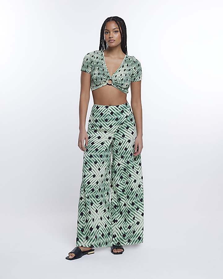 Green spot shirred cropped top
