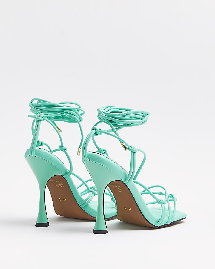 Green strappy heeled sandals
