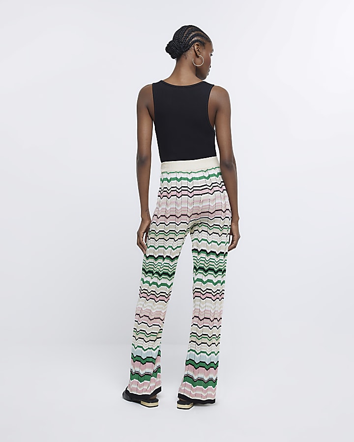 Green striped flare trousers