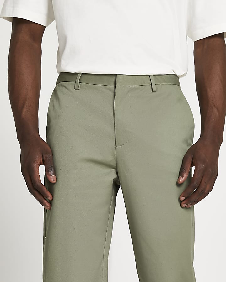 Green tapered chinos